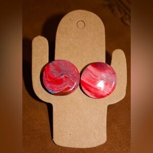 Clay stud earrings topped with resin